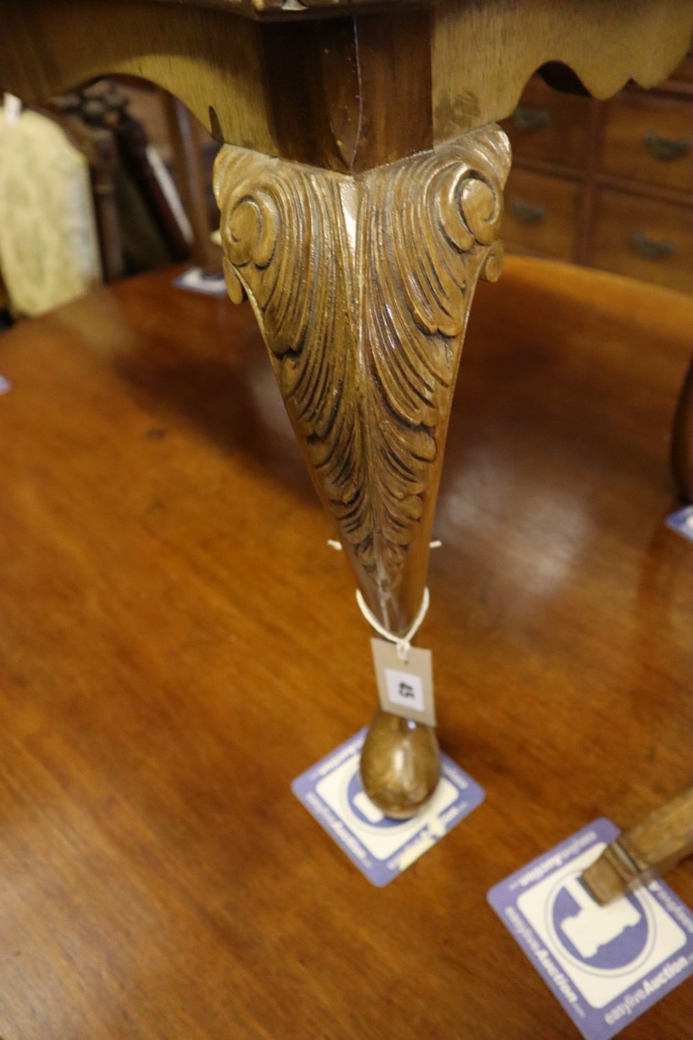 A brass mounted walnut tripod wine table and a Queen Anne style walnut low table, tripod table diameter 34cm height 75cm